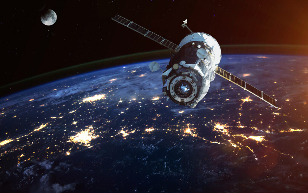 Artists impression of satellite in orbit around earth