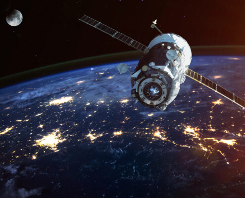 Artists impression of satellite in orbit around earth
