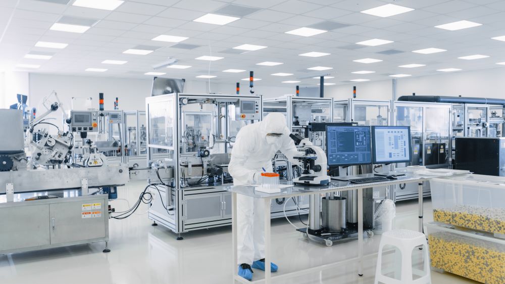 Scientists working in pharmacology lab where lifescience MEMS are used