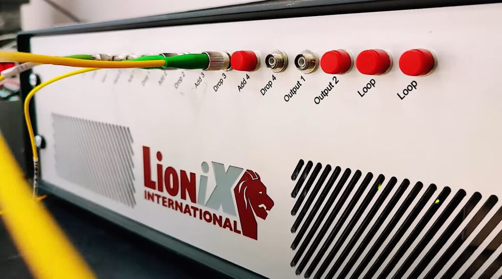 The benchtop solution developed by LioniX International, including the ROADM PIC and its ancillary components.