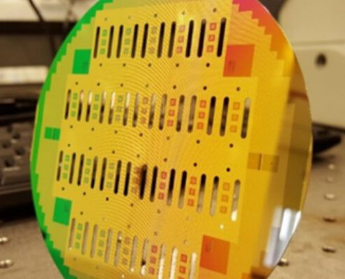 Through wafer holes created using deep reactive ion etching of silicon